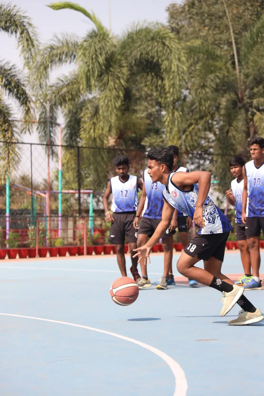 Students playing basketball